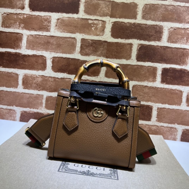 G*u*i top handle bags